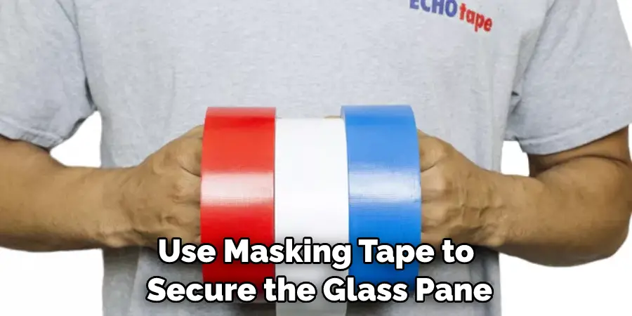 Use Masking Tape to Secure the Glass Pane