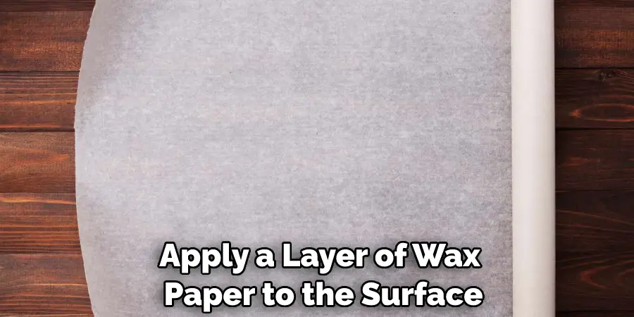 Apply a Layer of Wax Paper to the Surface