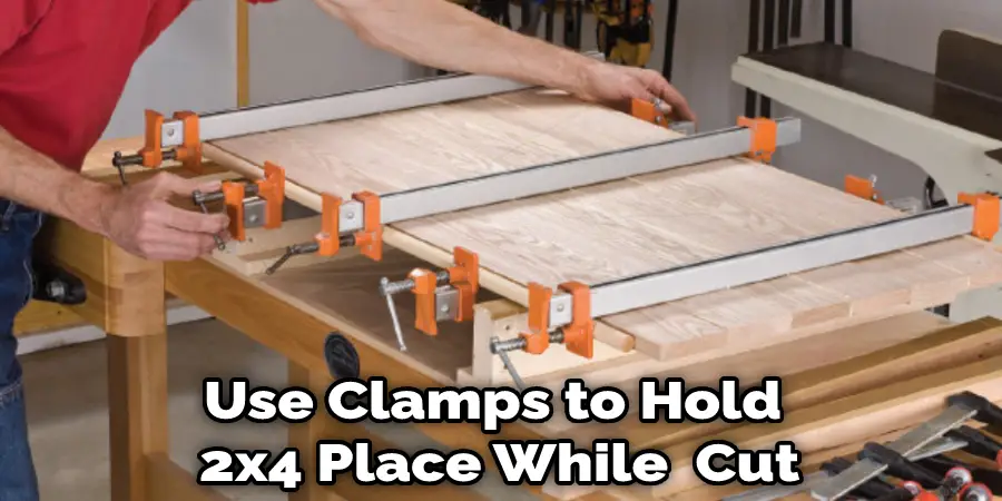 Use Clamps to Hold  2x4 Place While  Cut