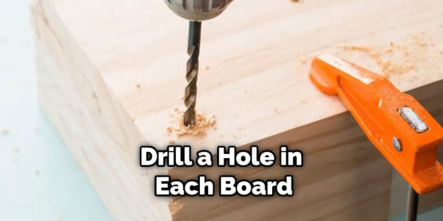 Drill a Hole in  Each Board