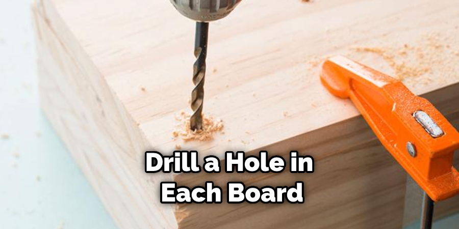 Drill a Hole in  Each Board