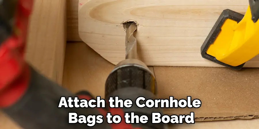 Attach the Cornhole Bags to the Board