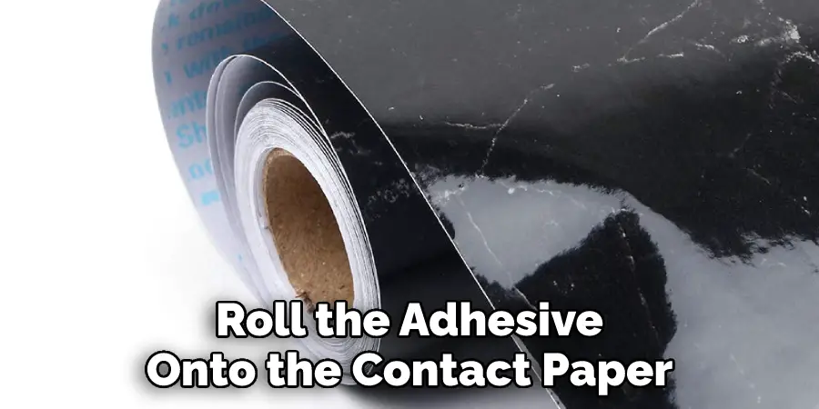 Roll the Adhesive Onto the Contact Paper
