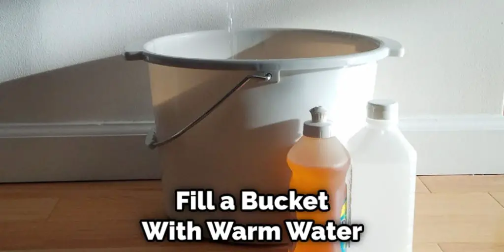 Fill a Bucket With Warm Water
