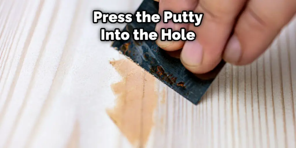 Press the Putty Into the Hole
