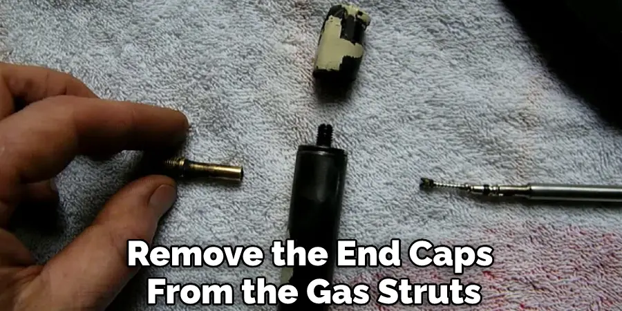 Remove the End Caps From the Gas Struts