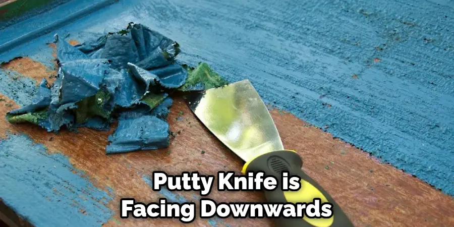 Putty Knife is Facing Downwards