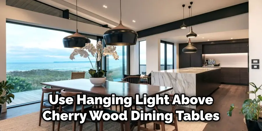 Use Hanging Light Above Your Cherry Wood Dining Tables