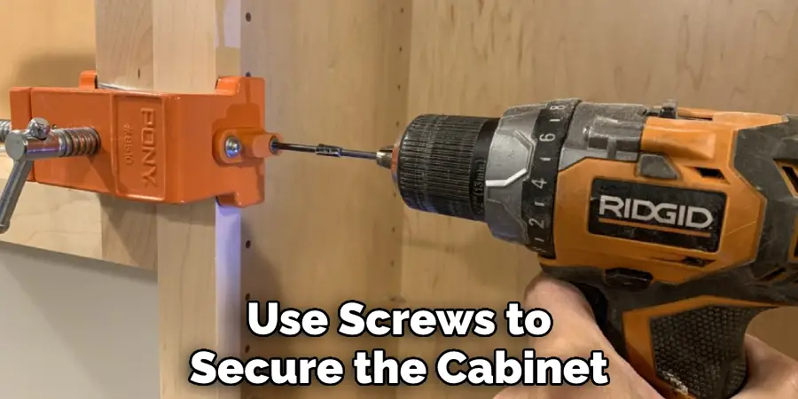 Use Screws to Secure the Cabinet