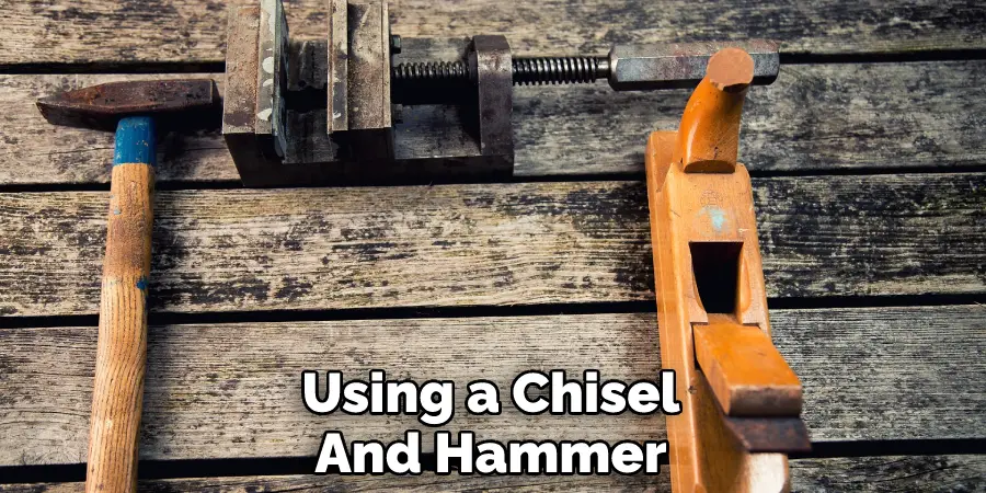Using a Chisel And Hammer