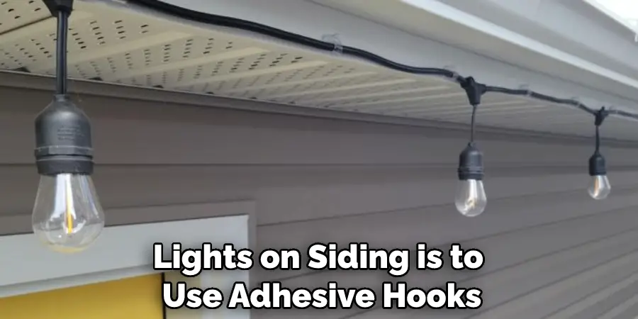 Lights on Siding is to Use Adhesive Hooks