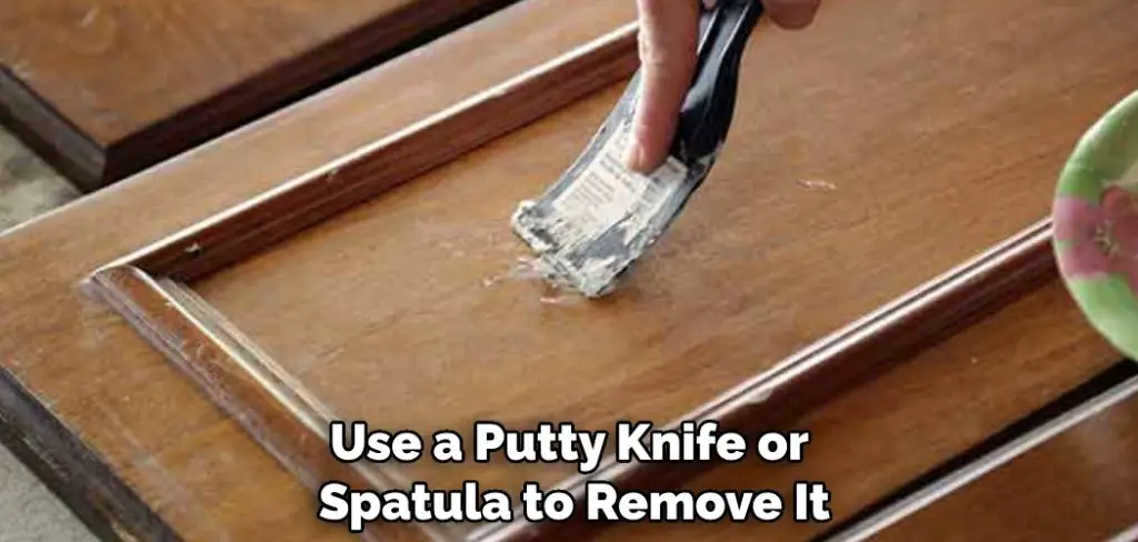 Use a Putty Knife or Spatula to Remove It