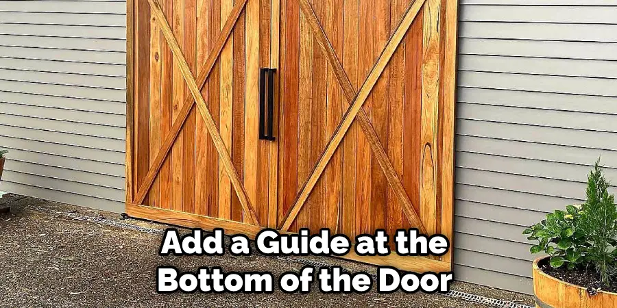 Add a Guide at the Bottom of the Door 