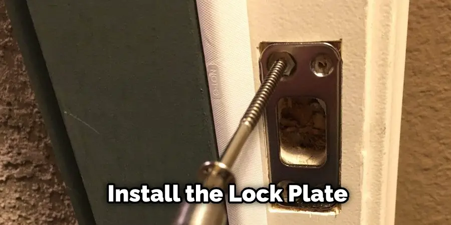  Install the Lock Plate