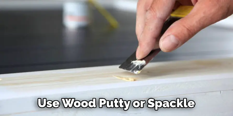 Use Wood Putty or Spackle