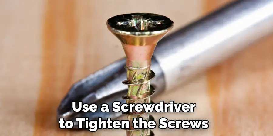 Use a Screwdriver to Tighten the Screws