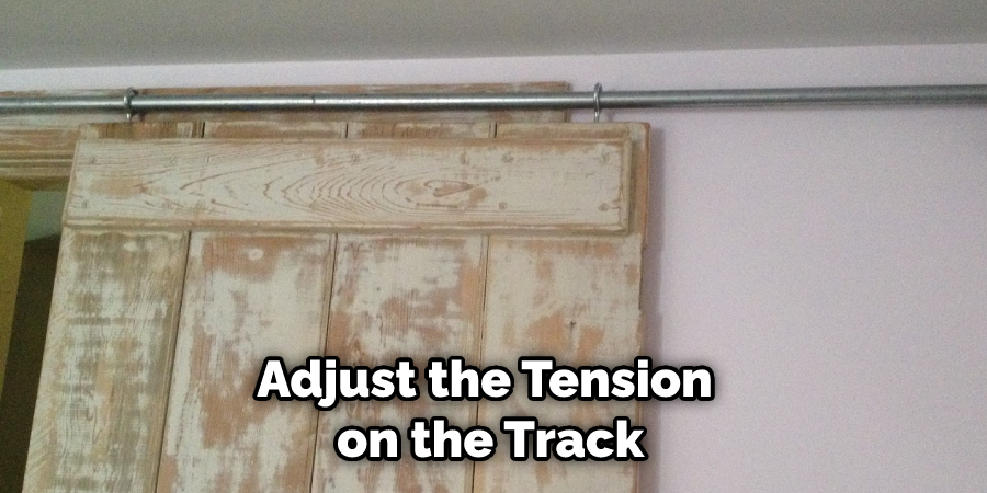 Adjust the Tension on the Track