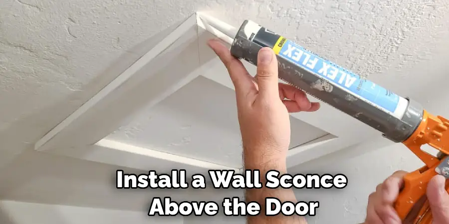 Install a Wall Sconce Above the Door