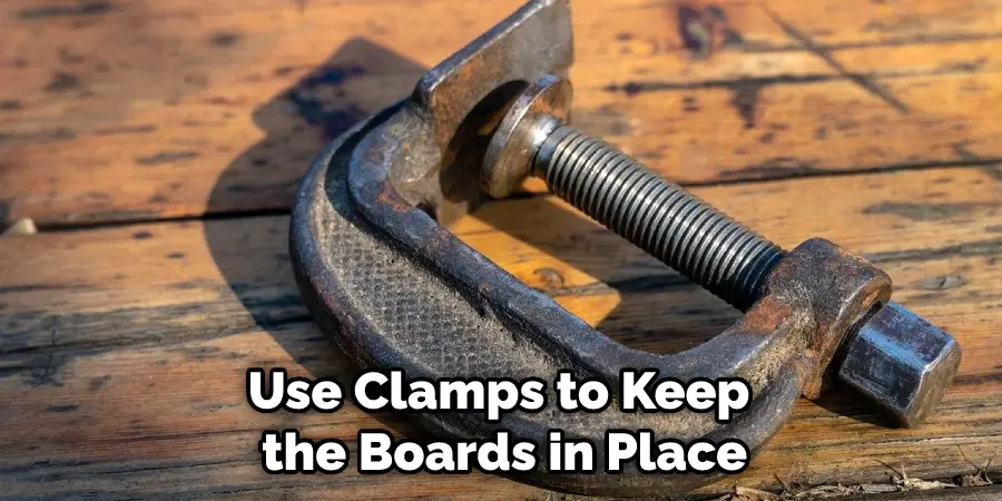 Use Clamps to Keep the Boards in Place