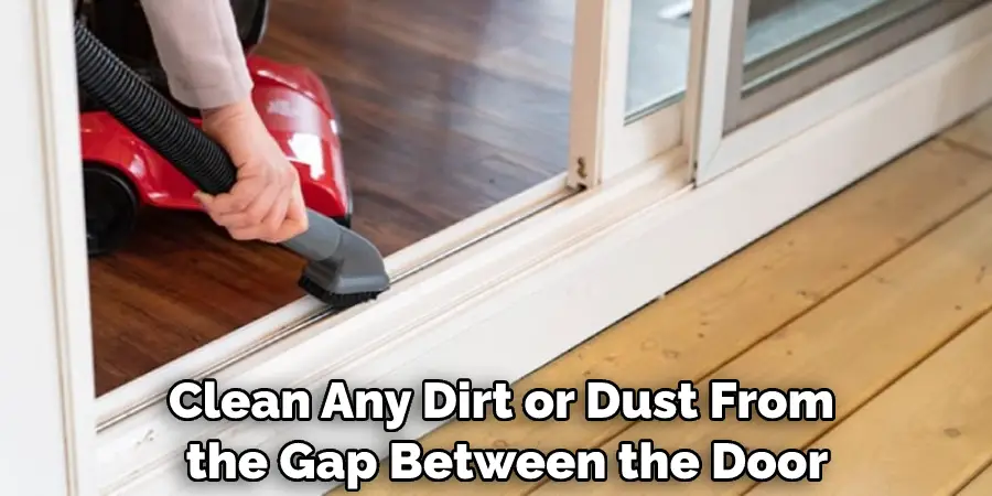 Clean Any Dirt or Dust From the Gap Between the Door