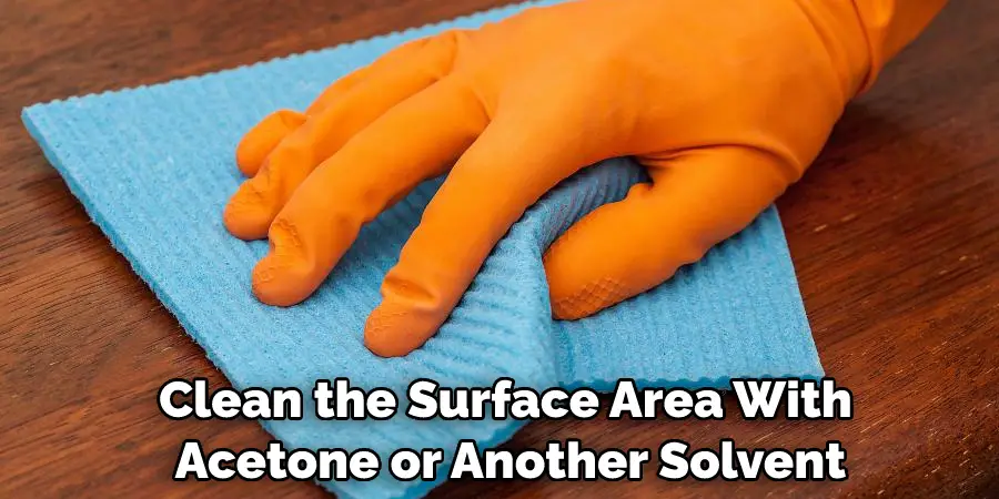 clean the surface area with acetone ore another solvent