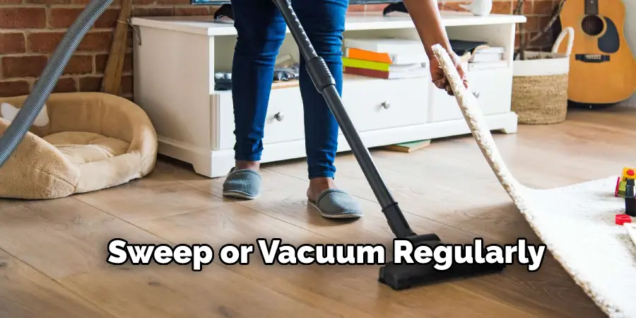 Sweep or Vacuum Regularly