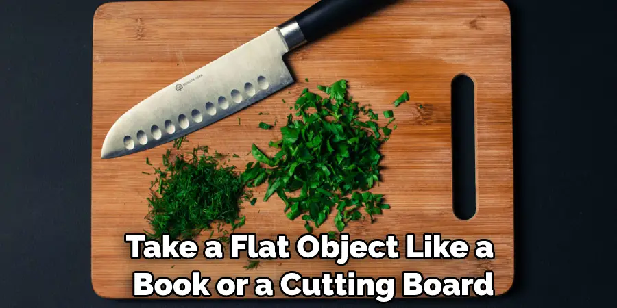 Take a Flat Object Like a Book or a Cutting Board