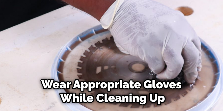 Wear Appropriate Gloves While Cleaning Up