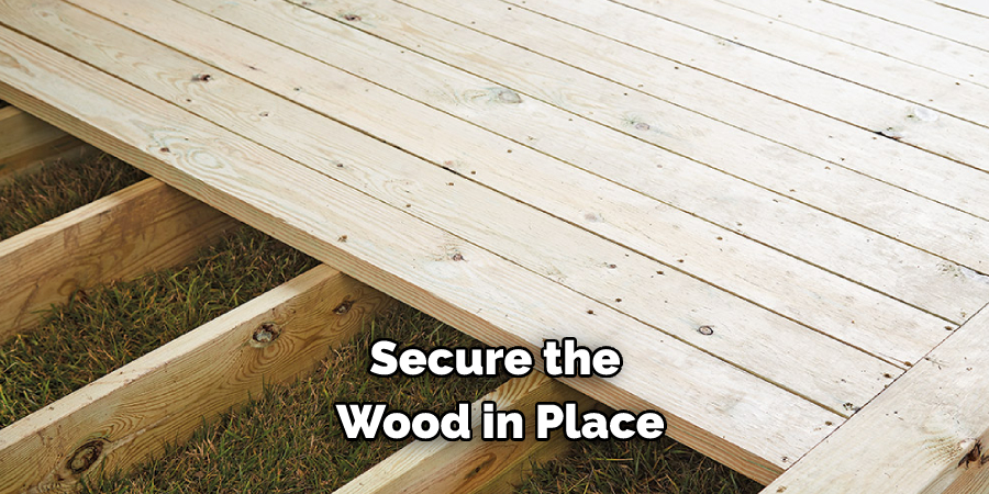 Secure the Wood in Place