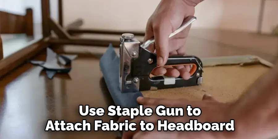 Use Staple Gun to Attach Fabric to Headboard