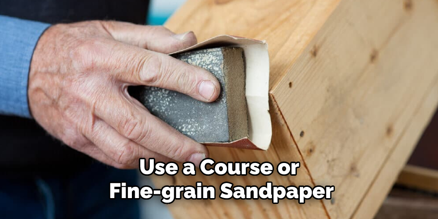 Use a Course or Fine-grain Sandpaper