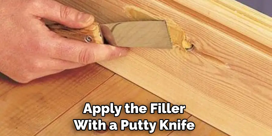 Apply the Filler With a Putty Knife