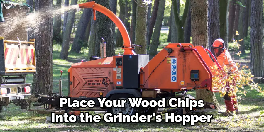 Place Your Wood Chips Into the Grinder's Hopper