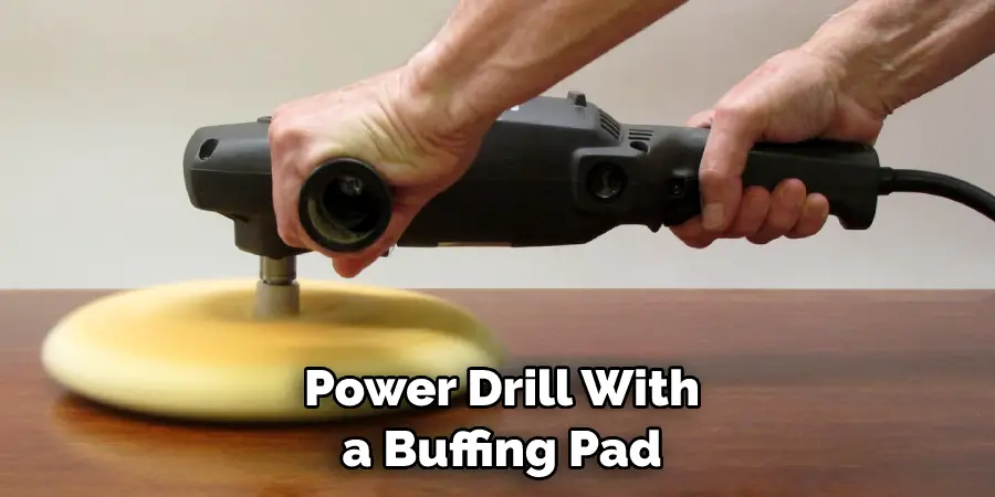 Power Drill With a Buffing Pad