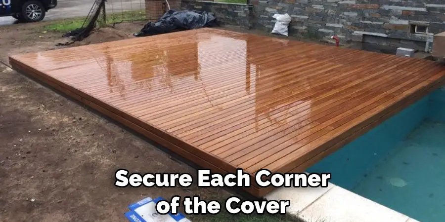Secure Each Corner of the Cover