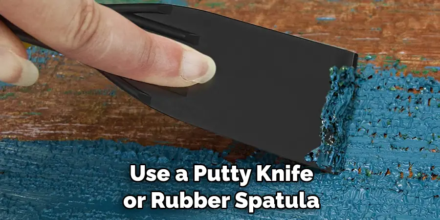 Use a Putty Knife or Rubber Spatula