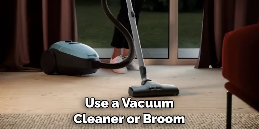 Use a Vacuum Cleaner or Broom