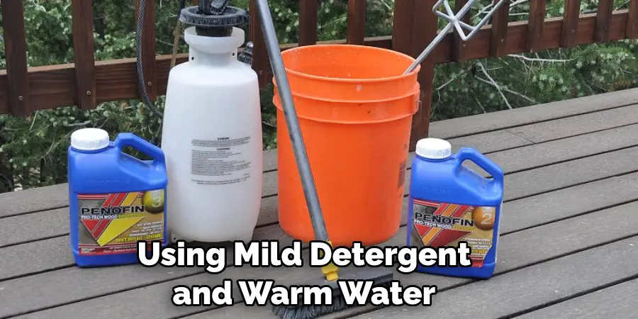 Using Mild Detergent and Warm Water