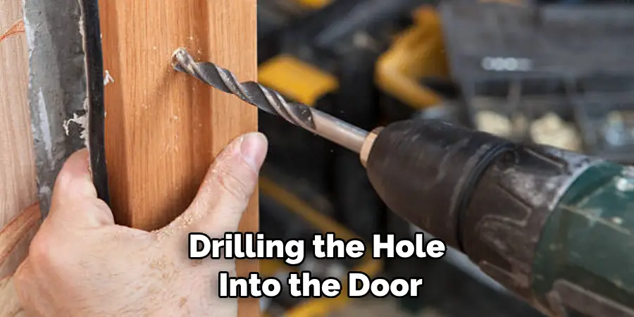 Drilling the Hole Into the Door