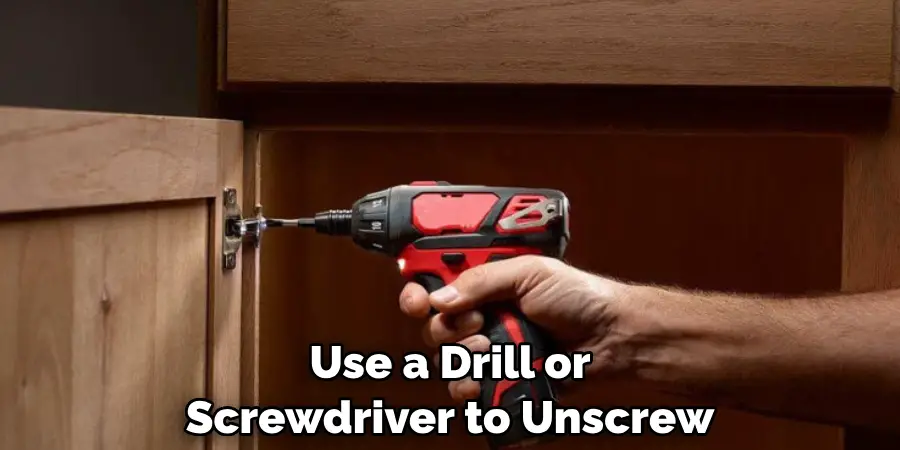 Use a Drill or Screwdriver to Unscrew