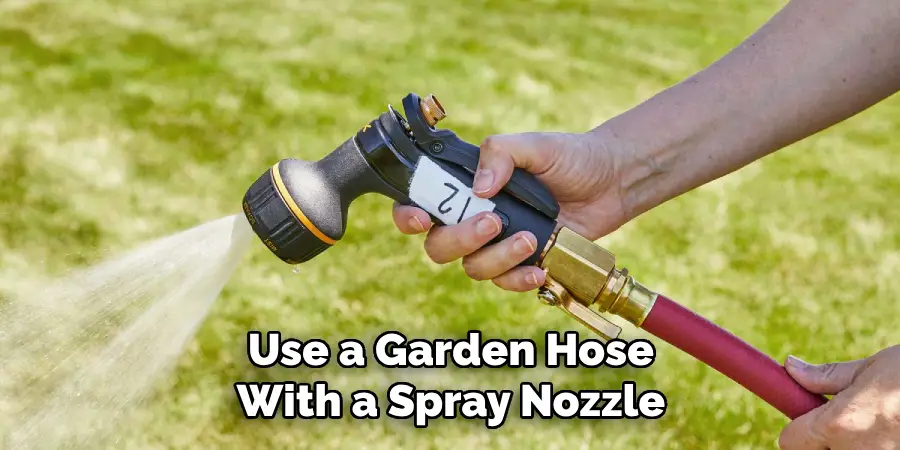 Use a Garden Hose With a Spray Nozzle