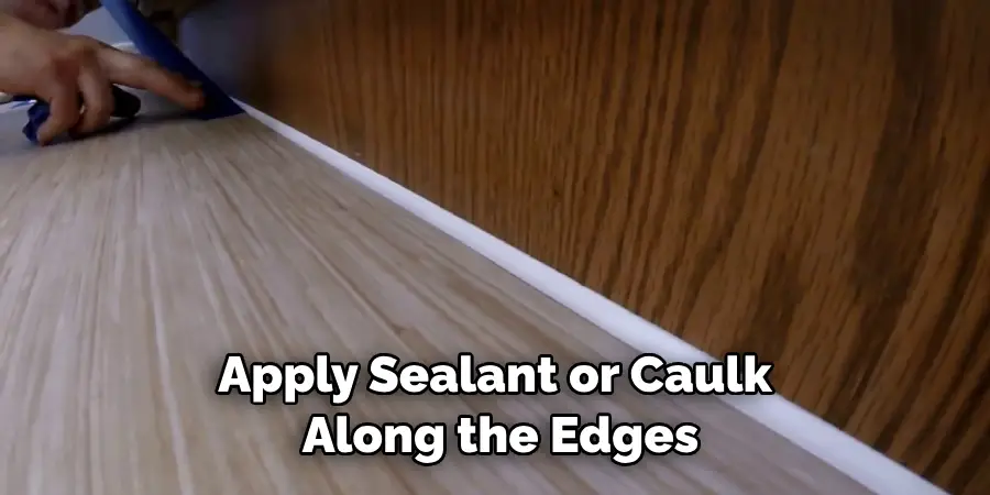 Apply Sealant or Caulk Along the Edges