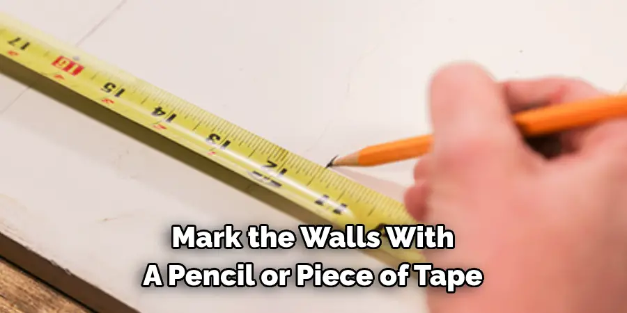 Mark the Walls With 
A Pencil or Piece of Tape