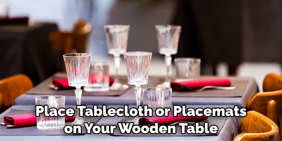 Place Tablecloth or Placemats on Your Wooden Table