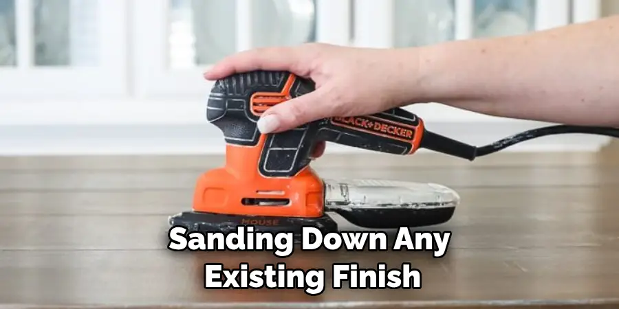Sanding Down Any Existing Finish