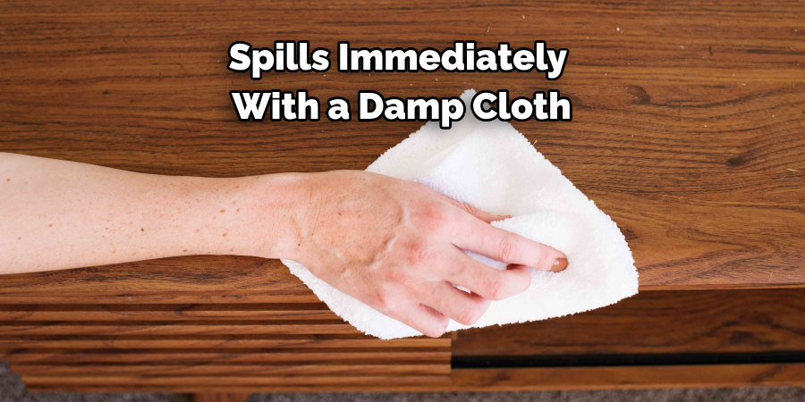 Spills Immediately 
With a Damp Cloth
