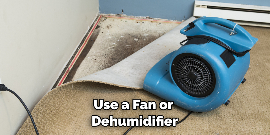 Use a Fan or Dehumidifier