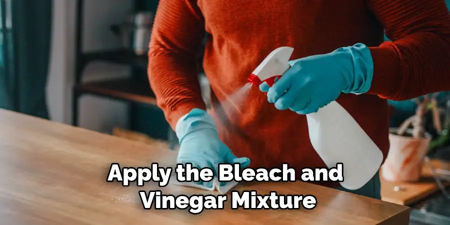 Apply the Bleach and Vinegar Mixture