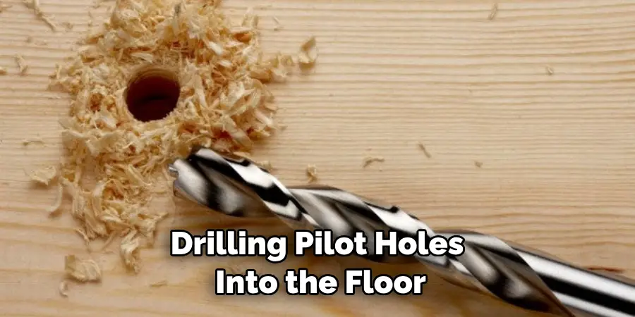 Drilling Pilot Holes Into the Floor