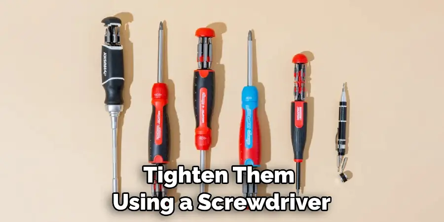 Tighten Them Using a Screwdriver